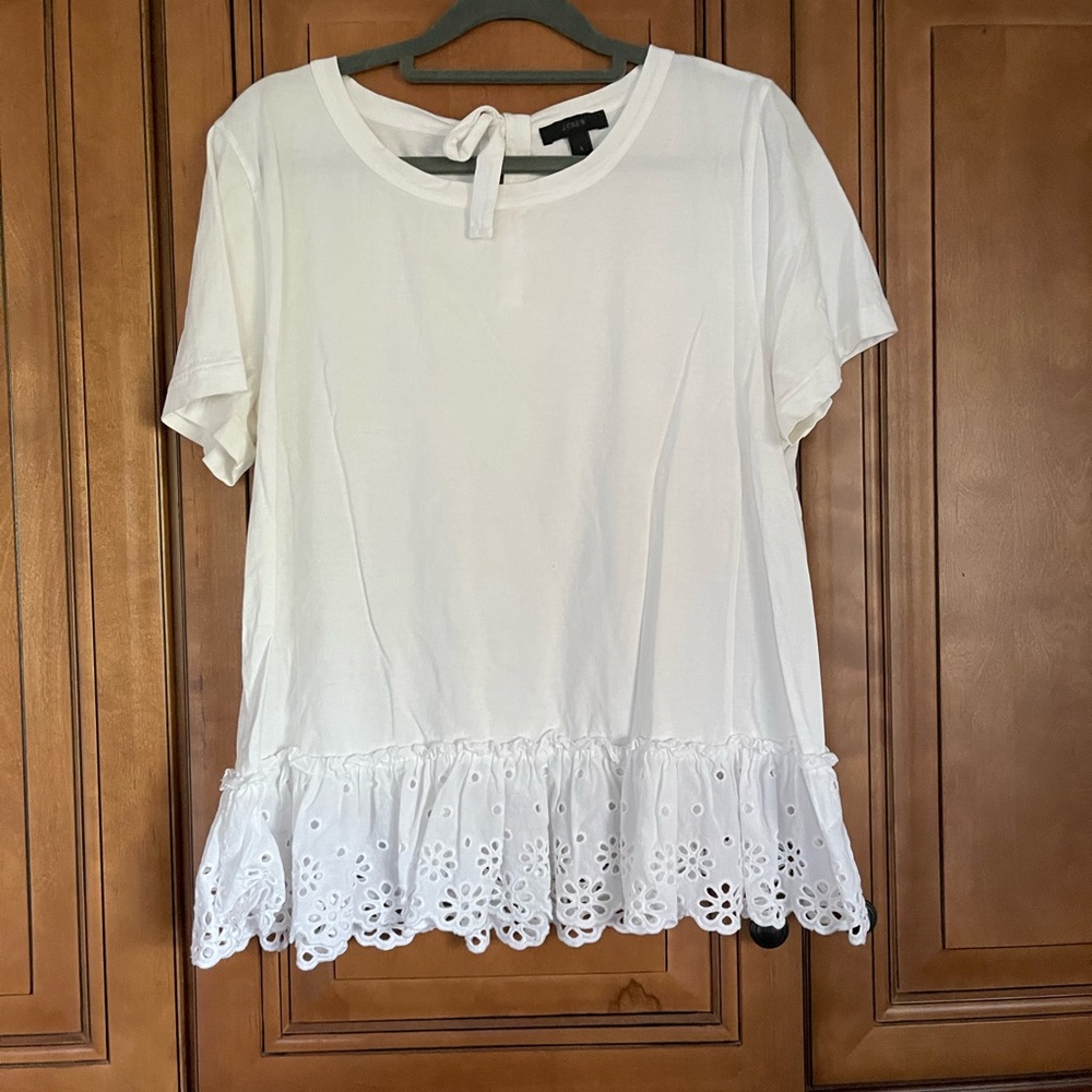 White cotton J Crew top with lace eyelet detail.